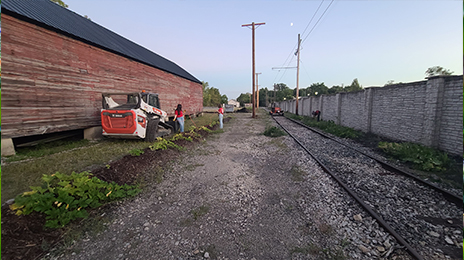 Alongside the Pennsylvania Railroad Freight House, our volunteers are hard at work on the pumpkin patch.